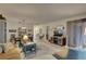 Open concept living room and dining area with a view into the bedroom at 2579 Bay Berry Dr # 42D, Clearwater, FL 33763