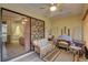 Relaxing sunroom with comfy seating and access to the bedroom at 2579 Bay Berry Dr # 42D, Clearwater, FL 33763