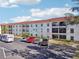 Building exterior showcasing ample parking at 2700 Bayshore Blvd # 1305, Dunedin, FL 34698