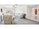 Living room with sectional sofa, recliner, and TV at 2700 Bayshore Blvd # 1305, Dunedin, FL 34698