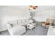Spacious living room with sectional sofa and ceiling fan at 2700 Bayshore Blvd # 1305, Dunedin, FL 34698
