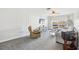 Living room with sectional sofa, recliner, and wall decor at 2700 Bayshore Blvd # 1305, Dunedin, FL 34698