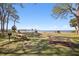 Relaxing picnic area with tables, grills, and waterfront views at 2700 Bayshore Blvd # 1305, Dunedin, FL 34698