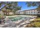 Shuffleboard courts and benches near building at 2700 Bayshore Blvd # 1305, Dunedin, FL 34698