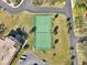 Aerial view of a tennis court in a community at 2700 Bayshore Blvd # 1305, Dunedin, FL 34698