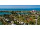 Home with a view of water and tennis courts in a charming coastal neighborhood at 3110 W De Bazan Ave, St Pete Beach, FL 33706
