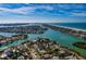 Stunning aerial view of the house and community from above at 3110 W De Bazan Ave, St Pete Beach, FL 33706