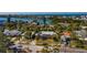 Aerial shot of the home showcasing landscaping and neighborhood at 3110 W De Bazan Ave, St Pete Beach, FL 33706