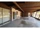 Large covered patio featuring an outdoor living space at 3110 W De Bazan Ave, St Pete Beach, FL 33706