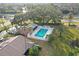Aerial view of community pool and surrounding area at 3185 Charter Club Dr # A, Tarpon Springs, FL 34688