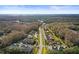 Aerial view of community, showcasing homes and landscaping at 3185 Charter Club Dr # A, Tarpon Springs, FL 34688