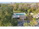 Aerial view showing community pool and clubhouse at 3185 Charter Club Dr # A, Tarpon Springs, FL 34688