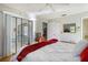 Bedroom with king-size bed and access to lanai at 3185 Charter Club Dr # A, Tarpon Springs, FL 34688