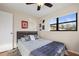 Bedroom with double bed, ceiling fan and window at 3185 Charter Club Dr # A, Tarpon Springs, FL 34688