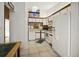 Bright kitchen features white appliances and ample cabinetry at 3185 Charter Club Dr # A, Tarpon Springs, FL 34688
