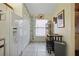 Efficient kitchen with white appliances and ample cabinet space at 3185 Charter Club Dr # A, Tarpon Springs, FL 34688