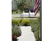 Front yard walkway with landscaping at 32857 Brooks Hawk Ln, Wesley Chapel, FL 33543