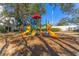 Fun playground for with slides and climbing structures at 3300 Haviland Ct # 303, Palm Harbor, FL 34684