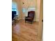 Bright bedroom with hardwood floors and a comfortable armchair at 3502 W Palmira Ave, Tampa, FL 33629