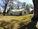 Ranch-style home with a metal roof and spacious yard at 3736 Florida Ranch Blvd, Zephyrhills, FL 33541