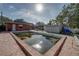 Mature trees surround a neglected pool in the backyard at 3929 13Th N Ave, St Petersburg, FL 33713