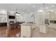 Open floor plan with kitchen, living area, and stone fireplace at 4023 W Horatio St, Tampa, FL 33609
