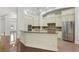 Large kitchen featuring an island and stainless steel appliances at 4023 W Horatio St, Tampa, FL 33609