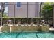 Inviting pool area with water features and screened enclosure at 4023 W Horatio St, Tampa, FL 33609