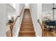 Elegant wooden staircase leading to upper level at 4023 W Horatio St, Tampa, FL 33609