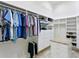 Large walk-in closet with ample shelving and hanging space at 4023 W Horatio St, Tampa, FL 33609
