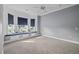 Bright bedroom with built-in window seat and neutral decor at 405 Chastain Rd, Seffner, FL 33584