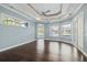 Spacious bedroom with hardwood floors and large windows at 405 Chastain Rd, Seffner, FL 33584