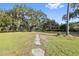 Stone pathway leading to a charming house at 405 Chastain Rd, Seffner, FL 33584