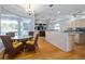 Kitchen with breakfast nook, island, and view of pool at 405 Chastain Rd, Seffner, FL 33584