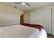 Bedroom with queen bed, ceiling fan, and large closet at 4175 104 N Ave, Clearwater, FL 33762