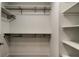 Large walk-in closet with double hanging rods and shelving at 4175 104 N Ave, Clearwater, FL 33762