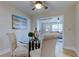 Open concept dining area with glass table and seating for four at 4175 104 N Ave, Clearwater, FL 33762