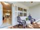 Inviting front porch with two comfy chairs and a small table, perfect for relaxing at 4175 104 N Ave, Clearwater, FL 33762
