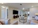 Open and airy living room with multiple seating areas at 4175 104 N Ave, Clearwater, FL 33762