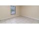 Spacious bedroom with tile flooring and neutral wall colors at 4651 Summerwind Dr # 26, Sarasota, FL 34234