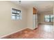 Kitchen dining area with tile floor and view into living room at 4651 Summerwind Dr # 26, Sarasota, FL 34234