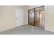 Bright laundry room with washer, dryer, and shelving at 4651 Summerwind Dr # 26, Sarasota, FL 34234