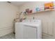 Functional laundry room, includes washer and dryer at 4651 Summerwind Dr # 26, Sarasota, FL 34234