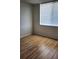 Bright bedroom with wood-look flooring and window coverings at 4915 Bay Ne St # 335, St Petersburg, FL 33703
