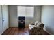 Bedroom with window coverings, flooring, and small couch at 4915 Bay Ne St # 335, St Petersburg, FL 33703