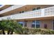 Exterior view of condo building with balconies and landscaping at 4915 Bay Ne St # 335, St Petersburg, FL 33703
