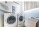 Laundry room with washer, dryer, and utility sink at 5312 17Th S Ave, Gulfport, FL 33707