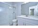 Modern bathroom with white vanity, quartz countertop, and large shower at 6112 Plover Meadow St, Lithia, FL 33547