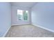 Spacious bedroom with neutral walls and carpeted floors at 6112 Plover Meadow St, Lithia, FL 33547