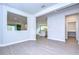 Bright dining area with view into the kitchen and backyard at 6112 Plover Meadow St, Lithia, FL 33547